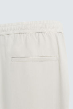 RELAXED FIT FLOWING TROUSERS - Zara фото 9