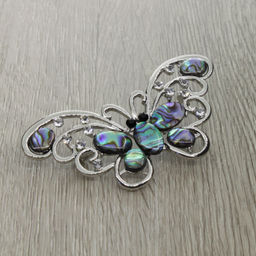 Брошь "Бабочка" со вставками из гелиотиса и ювелирного сплава