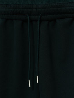 Теплые брюки джоггеры мужские зеленые с начесом - Mark formelle фото 8