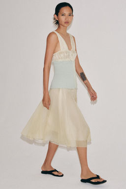 FALDA MIDI COMBINADA / Arena claro