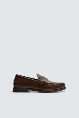 LEATHER MOCCASIN WITH MASK DETAIL