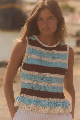 STRIPED KNIT TOP WITH RUFFLE