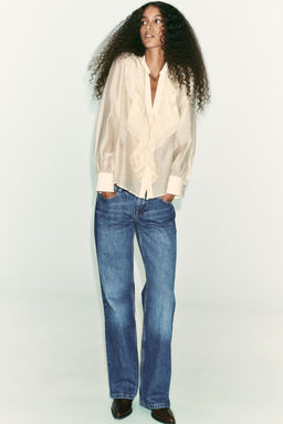 RUFFLED BLOUSE WITH TIES