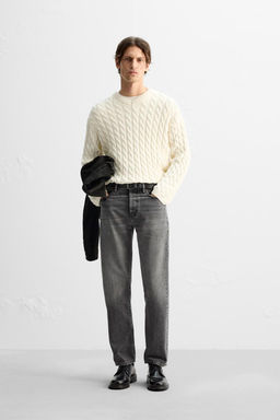 TEXTURED CABLE-KNIT SWEATER