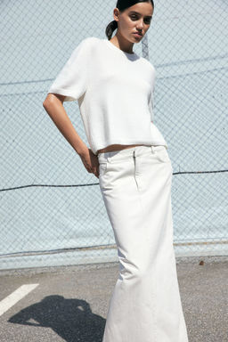 Top de manga corta en punto fino