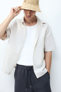 Pantal?n corto efecto neopreno Relaxed Fit - H&m фото 10