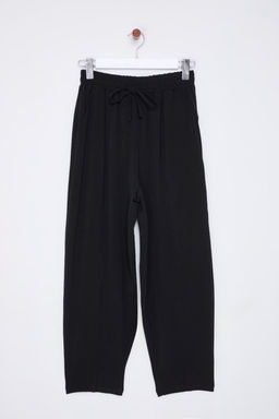TRENDYOLMILLA Siyah Beli Lastikli Harem/Salvar Rahat Kesim Dokuma Pantolon TWOSS25PL00027