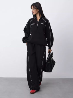 Спортивные брюки с декоративными кантами