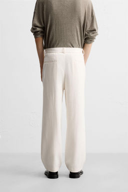 TEXTURED REGULAR FIT TROUSERS - Zara фото 33