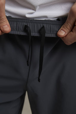 Шорты текстильные Темно-синий ADVANCED RUNNING Woven Shorts - Anta фото 3