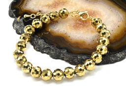 Браслет из циркона шарик гр.8мм цв.золотистый, 18см