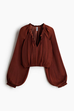 Blusa con mangas globo