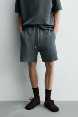 BERMUDA JOGGER RELAXED FIT INTERLOCK / verde lavado - Zara фото 2