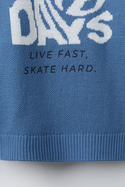 KNIT SWEATER WITH SLOGAN