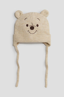 Gorro beanie de punto con tiras de anudar
