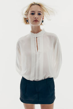 Blusa vaporosa con jaretas