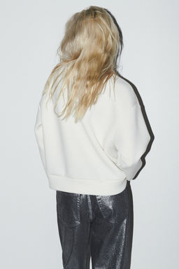 Sudadera efecto neopreno con tachuelas - H&m фото 4
