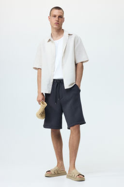 Pantal?n corto efecto neopreno Relaxed Fit - H&m фото 5
