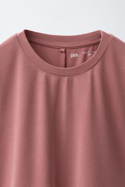 CAMISETA FLUIDA GYM CON MODAL / Rosa empolvado