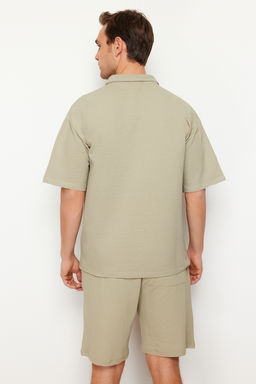 TRENDYOL MAN Premium Tas Oversize/Genis Kesim Yaz? Nak?sl? Dokulu Polo Yaka T-Shirt TMNSS24PO00011 - Trendyolmilla фото 7