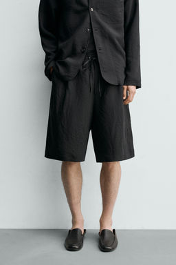 BERMUDA FLUIDA JACQUARD RAYAS / Negro - Zara фото 2