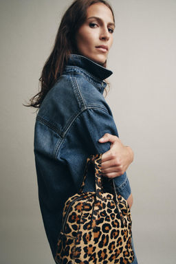 MINI BOWLING BAG WITH ANIMAL PRINT LEATHER AND SHEEPSKIN