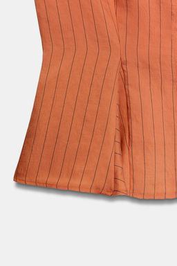 CHALECO RAYAS PEPLUM / Caldero