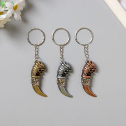 Цена за 12 шт. Брелок металл " Клык саблезубого" МИКС 4,5х1,5 см