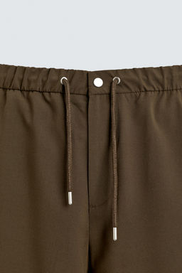 BERMUDA T?CNICA RELAXED FIT / Tabaco