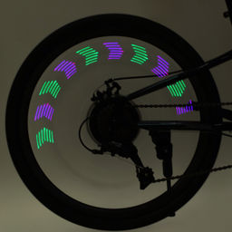 Фонарь подсветка для колес COMIRON A02 корпус: пластик; свет 14 RGB LED; ААА батарея; влагозащита IPX5; 30 рисунков. /уп 100/ - Галеонтрейд фото 4