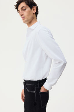 Camisa en tejido el?stico multidirecci?n Slim Fit - H&m фото 10
