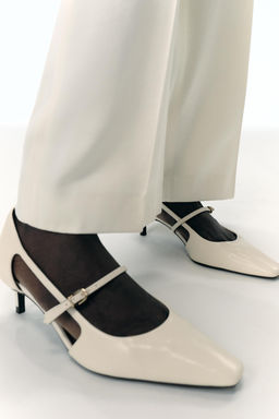 HEELED SHOES WITH SIDE CUT-OUTS
