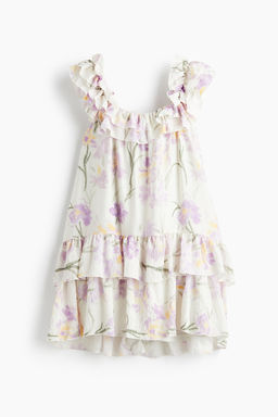 Vestido con ribetes de volante
