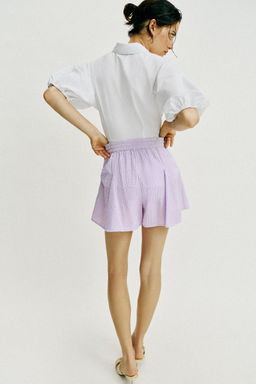 FALDA PANTAL?N CUADRO VICHY VUELO / Malva
