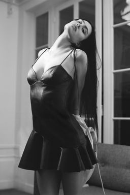 SHORT FAUX LEATHER DRESS WITH RUFFLE