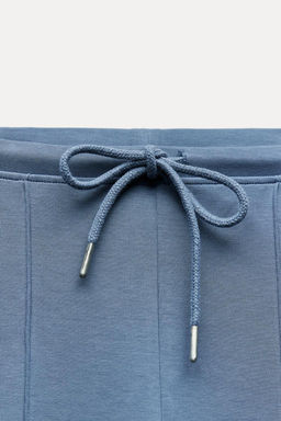 STITCHED INTERLOCK BELL BOTTOM TROUSERS - Zara фото 34