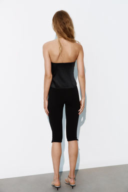 TOP CORSETERO SATINADO PALABRA DE HONOR / Negro