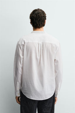 Поло CAMISA POLO EFECTO ARRUGADO белое