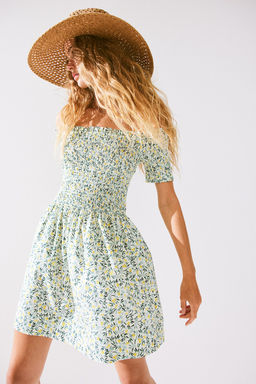 Vestido off-the-shoulder con cuerpo nido de abeja