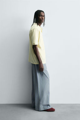 STRIPED OVERSIZE FIT TROUSERS