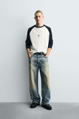 RELAXED FIT EMBROIDERED NFL MIAMI DOLPHINS JEANS