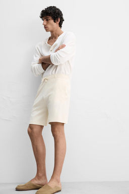 TEXTURED RELAXED FIT BERMUDA SHORTS - Zara фото 6