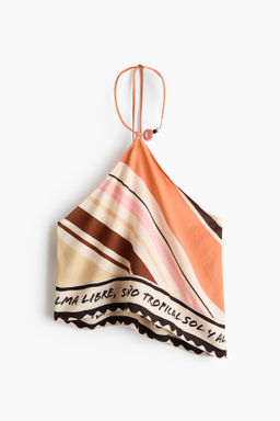 Top playero estampado con escote halter