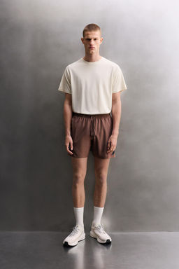 PANTALONES CORTOS B?SICOS ENTRENAMIENTO 7 / Rojo oscuro