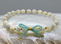 Браслет с шариками из перламутра бантик из амазонита, 17см