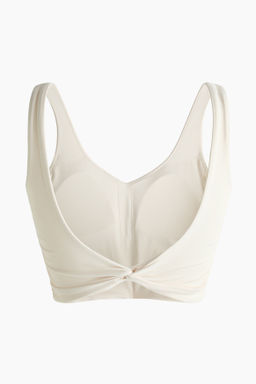 Top de tirantes SoftMove con detalle girado - H&m фото 7