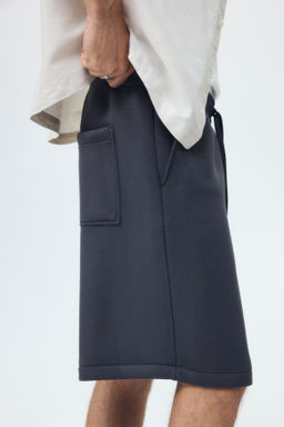 Pantal?n corto efecto neopreno Relaxed Fit - H&m фото 7