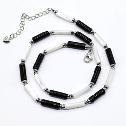 Чокер из перламутра и агата черного цилиндр 4*13мм, 40см Радуга камня