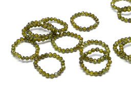 Колечко на резинке из фианитов цвет зеленый