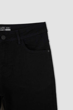 Супероблегающие джинсовые брюки с нормальной талией и очень узкими штанинами - Defacto фото 10